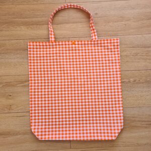 Riidest kott 50x47 cm põhi 10 cm, truki kinnitusega, oranž ruudud